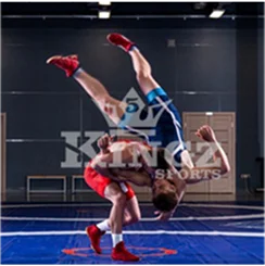 Wrestler performing a high-impact throw in 5 Kingz Sports uniform